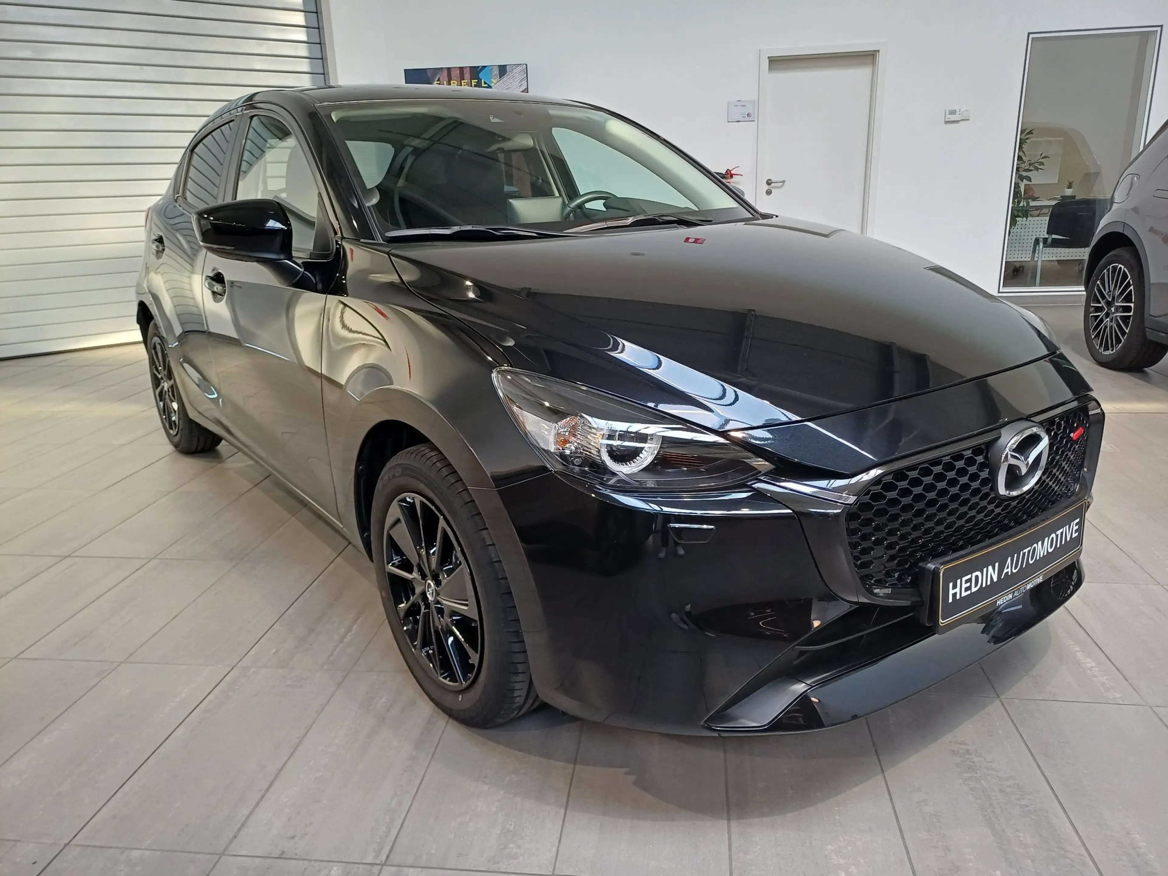 Mazda 2 — photo 3