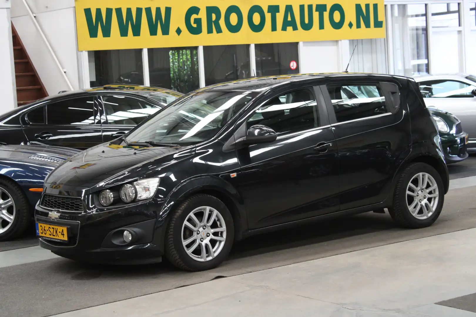 Chevrolet Aveo 1.4 LTZ Airco, NAP, Cruise control, Isofix Zwart - 1