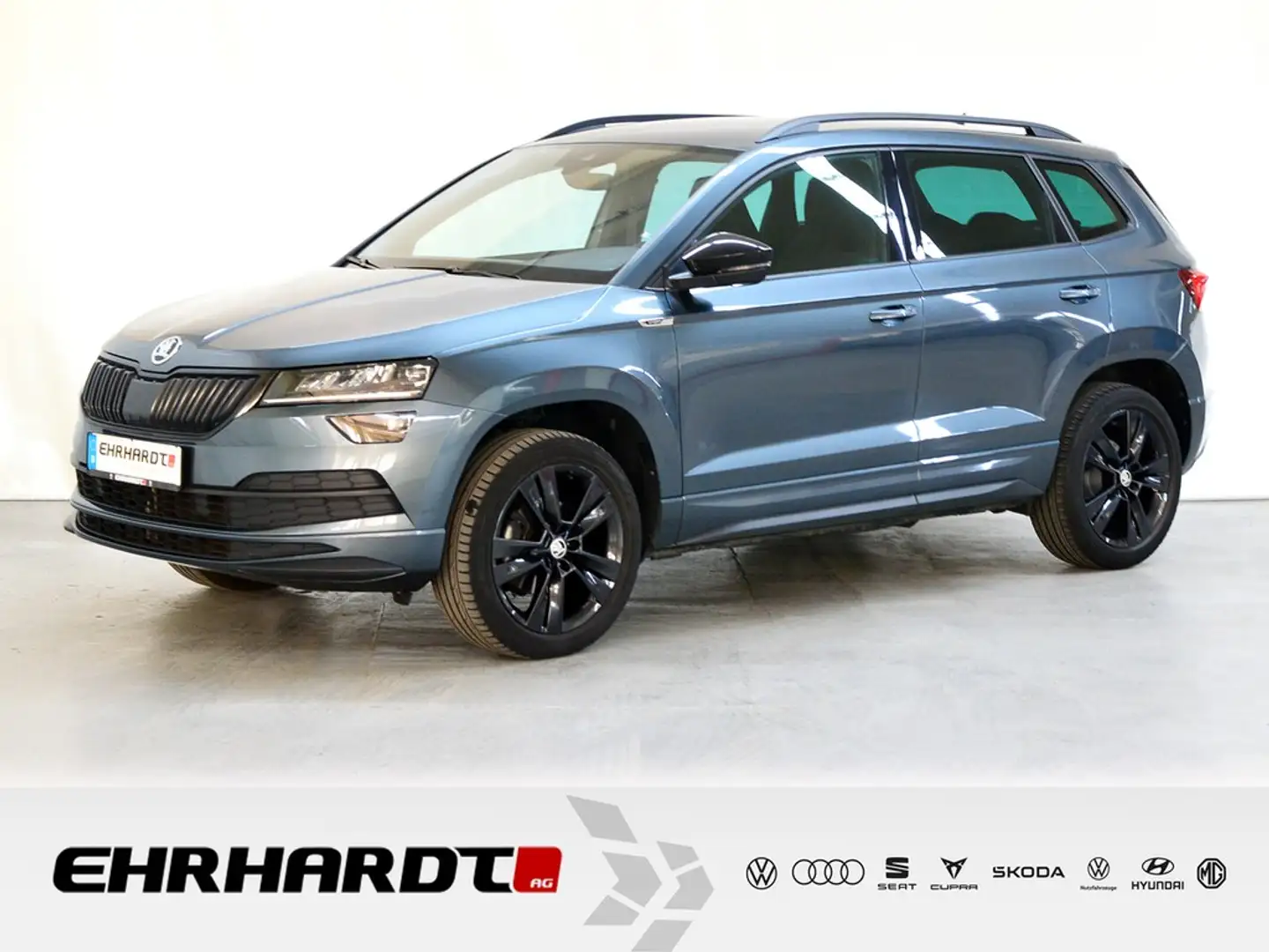 Skoda Karoq 1.5 TSI ACT Sportline AHK*LED*NAV*SHZ*PDC*TEMPO... Grau - 1