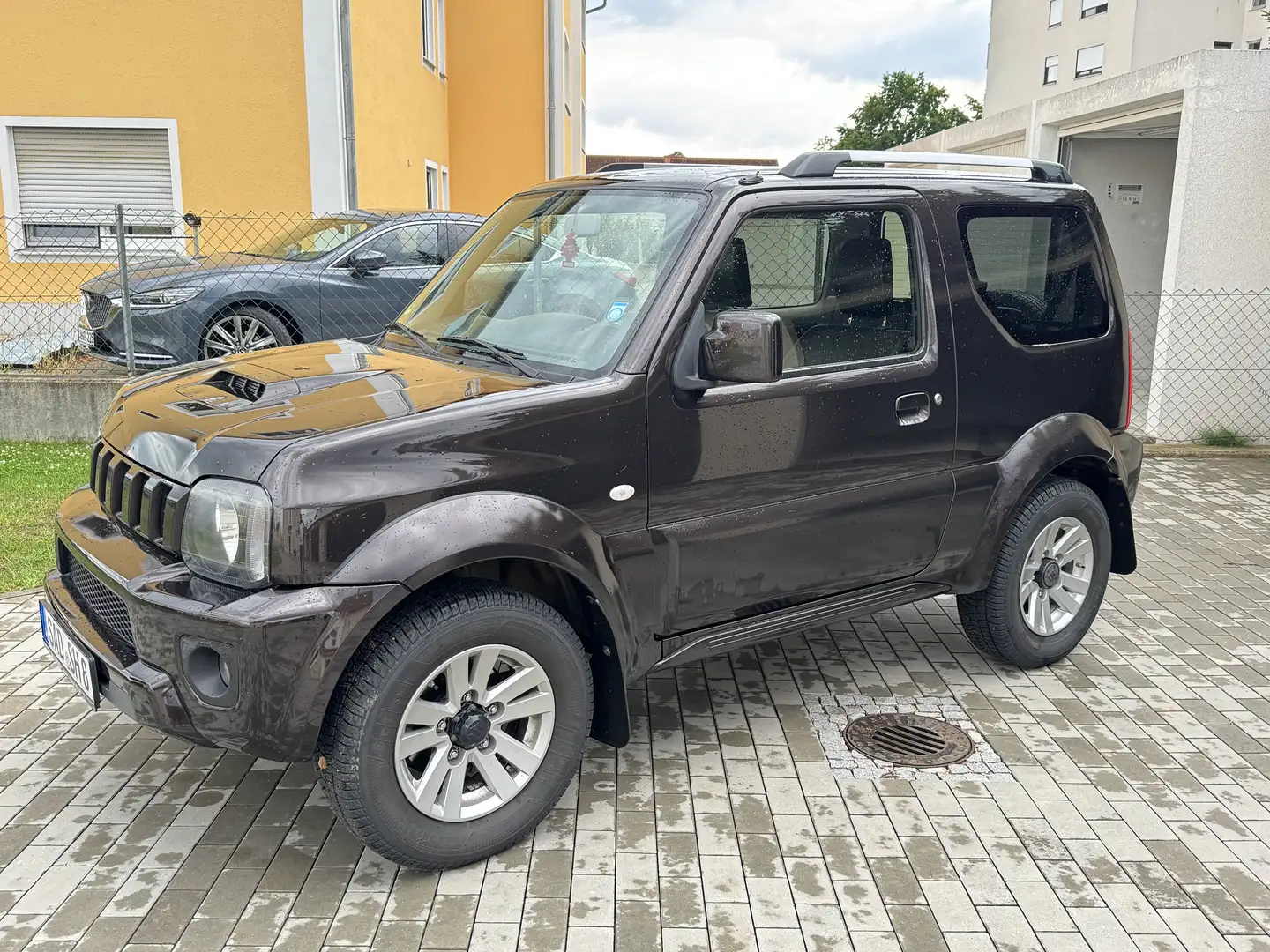 Suzuki Jimny Comfort Leder / Klima / AHK / Allrad Braun - 1