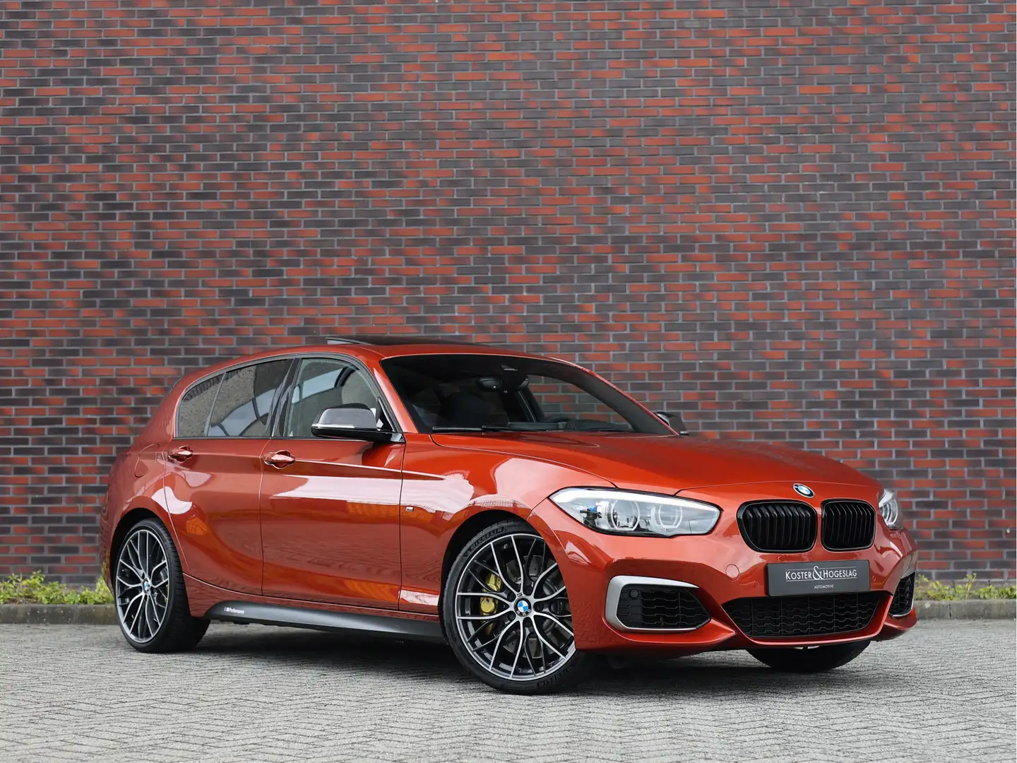 BMW 140 1-serie M140i Edition Shadow Executive | M Perform Naranja - 1