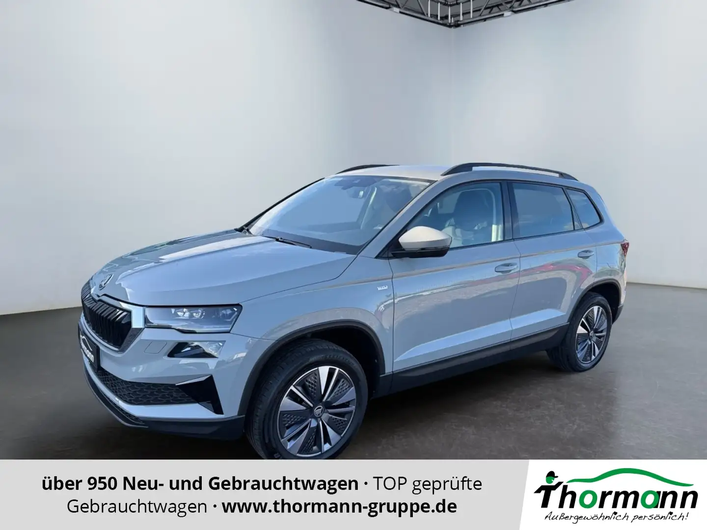 Skoda Karoq Tour 1.5 TSI ACT 4xSitzheiz,AHK,Rückfahrkam Grau - 1