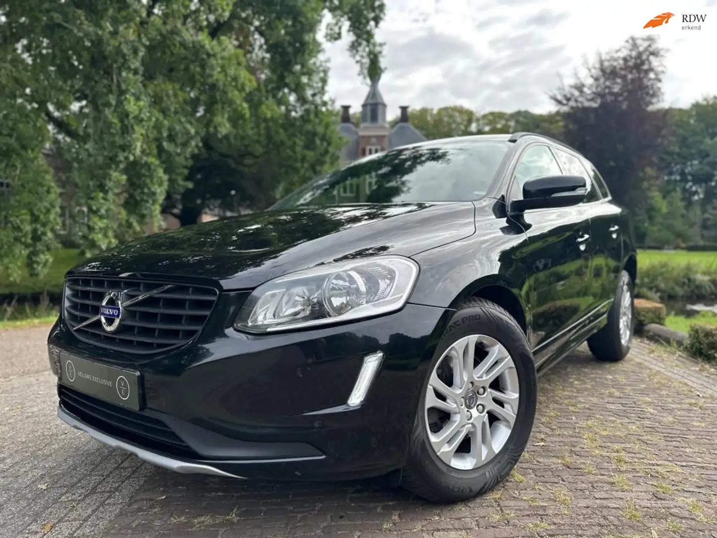 Volvo XC60 2.0 D4 AWD | Polar+ | Leder | Trekhaak | Noir - 1