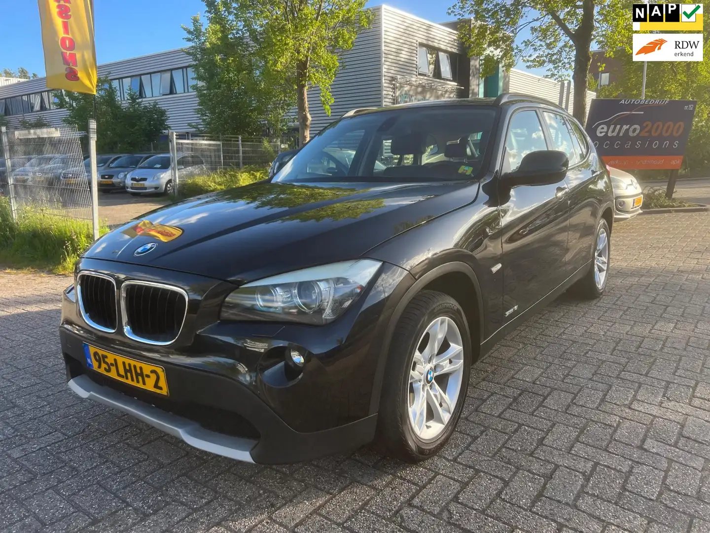 BMW X1 SDrive18i Executive. - Afneembare trekhaak - leder Zwart - 1