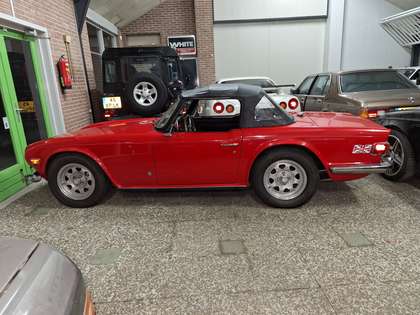 Triumph TR6 red with black interior completely restored LHD!