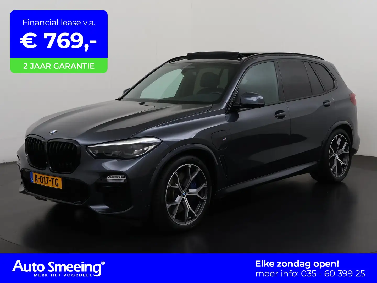 BMW X5 xDrive45e M Sport Shadow Line | Panoramadak | Trek Grijs - 1