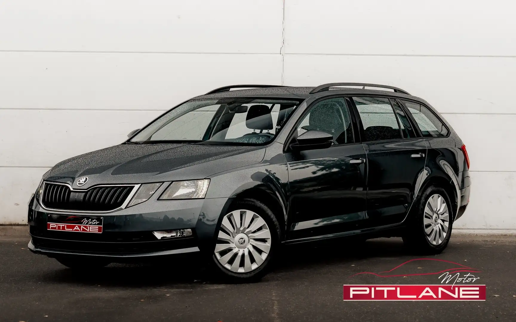 Skoda Octavia Combi 1.0 TSI Ambition DSG 7 / ATTELAGE / CARPLAY Grijs - 1
