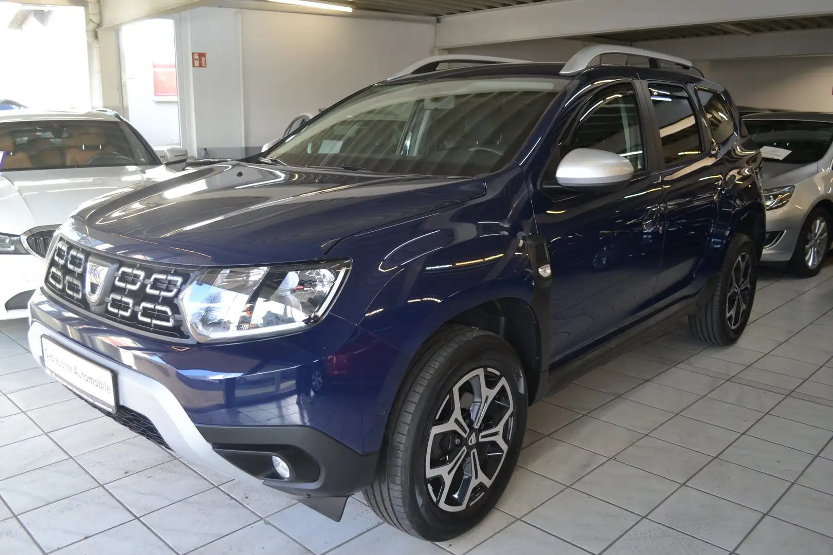 Dacia Duster 1.5 DCi Prestige *KAMERA360*NAVI*KLIMAAUTOMATIK* Blau - 1