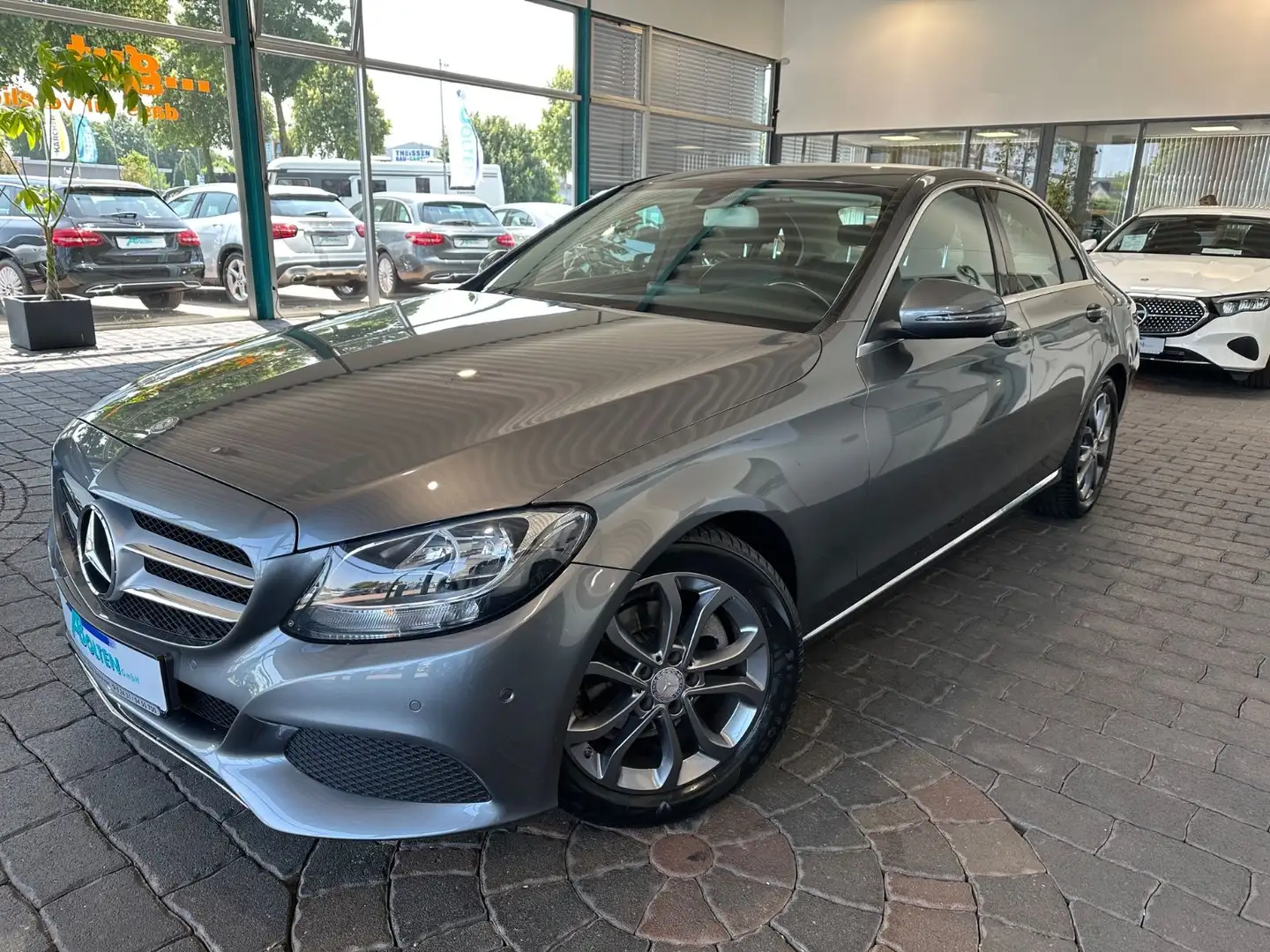 Mercedes-Benz C 180 9G tron.-Avantg.-Stdhz.-PTS-Navi Grijs - 1