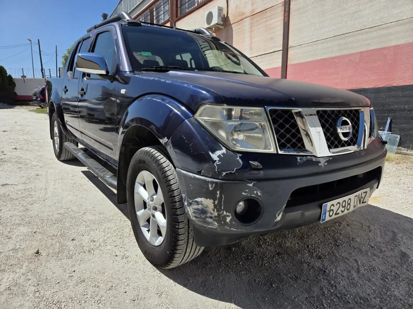Nissan Navara 2.5dCi SE DCb. 4x4 Blauw - 1