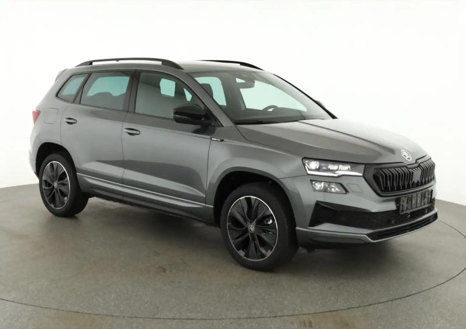 Skoda Karoq Sportline 1.5 TSI DSG Sportline, AHK, Navi, Mat... Grau - 1