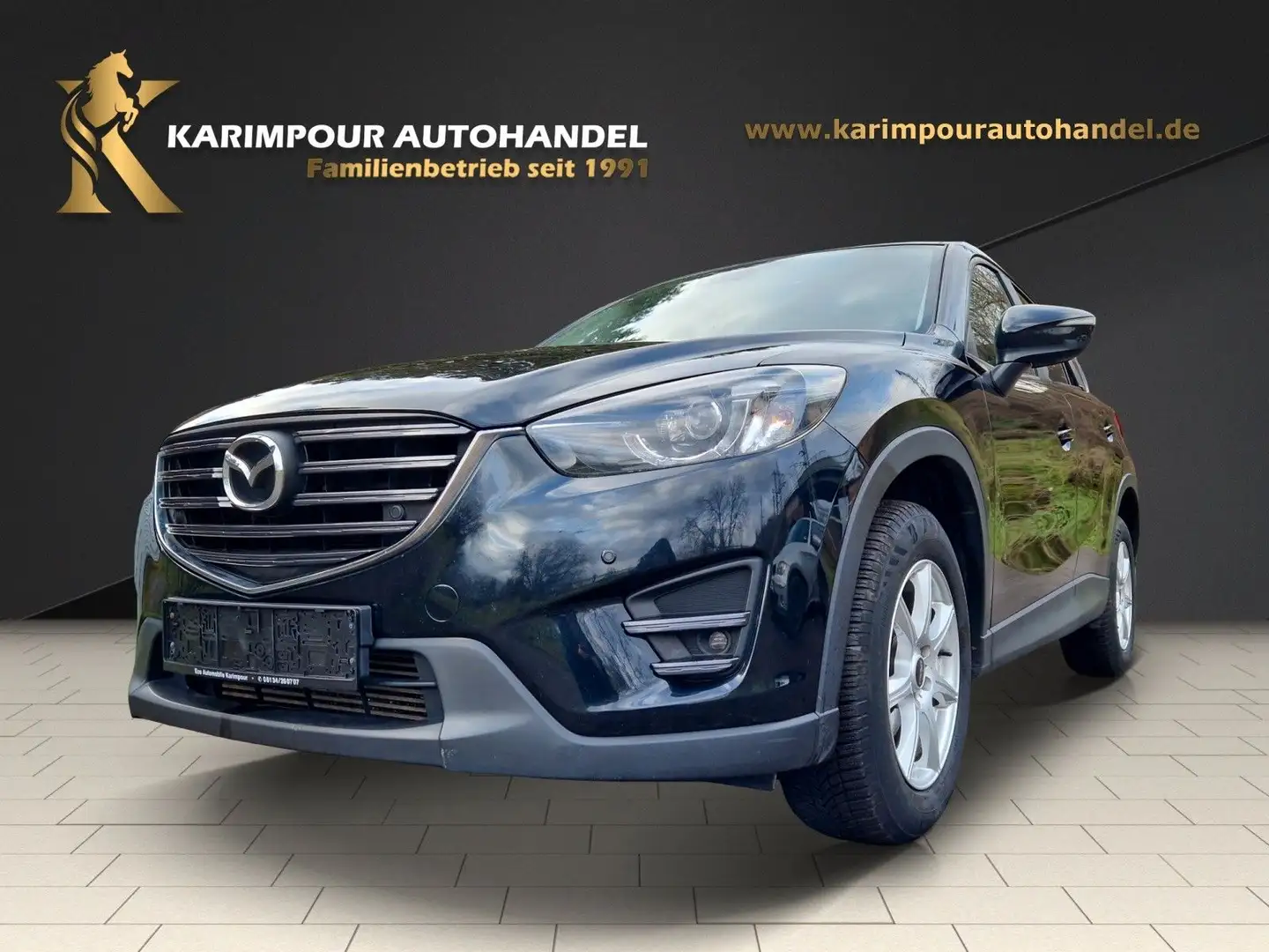 Mazda CX-5 Exclusive-Line 2WD *Nav*SHZ*Tempomat* Schwarz - 1