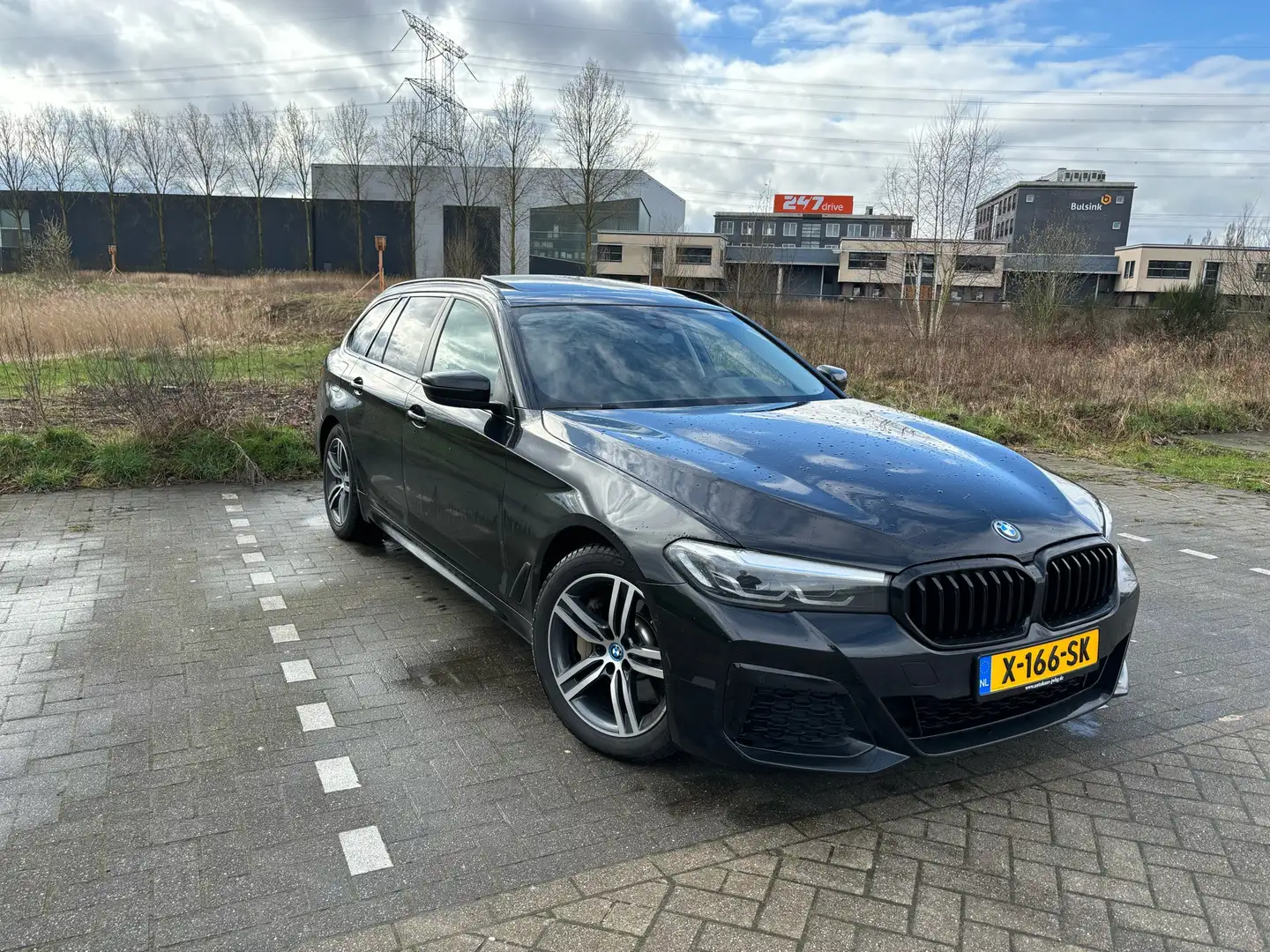 BMW 520 520e Touring Aut. Luxury Line Zwart - 1