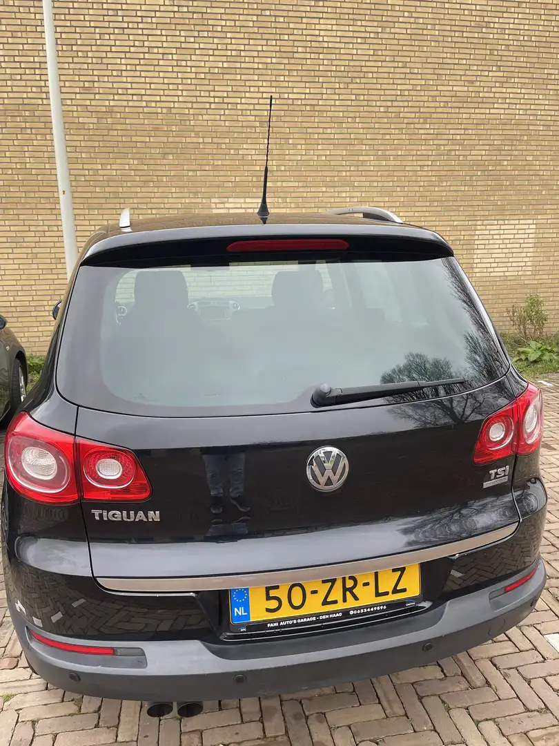 Volkswagen Tiguan 1.4 TSI Sport&St. 4M Zwart - 2