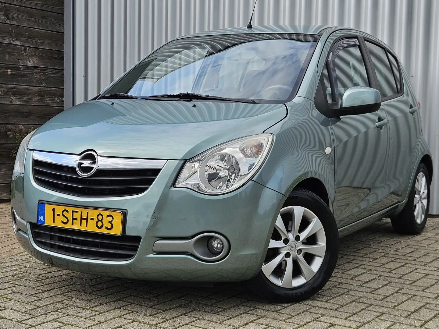 Opel Agila 1.0 Edition /Airco/PDC/Navi/LMV/90.619km NAP! Groen - 1