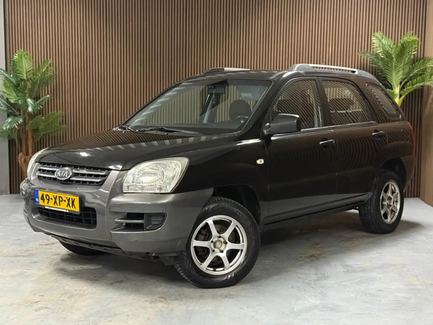 Kia Sportage 2.0 CVVT Comfort Schwarz - 1