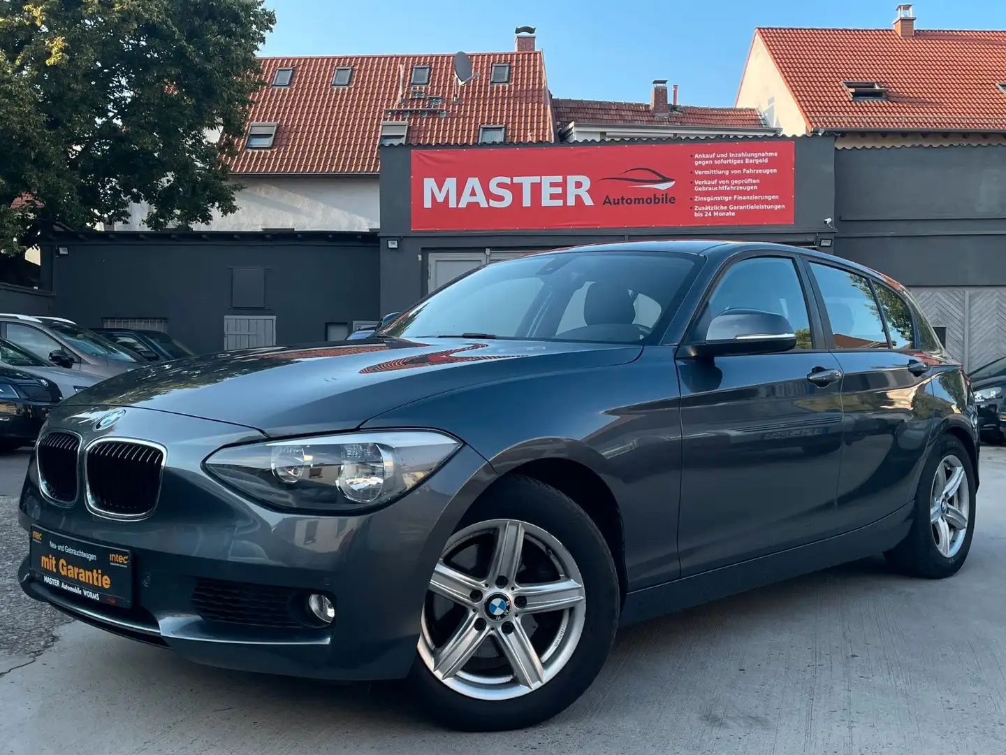BMW 118 i Lim. *AUTOMATIK*PDC*SHZ*TÜV NEU* Grau - 1