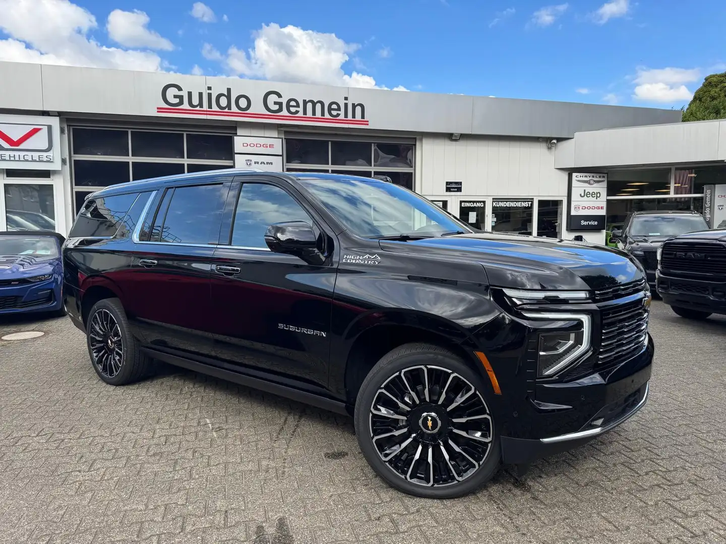 Chevrolet Suburban 6.2 V8 High Country Facelift 2025 + 24" Alufelgen Noir - 2