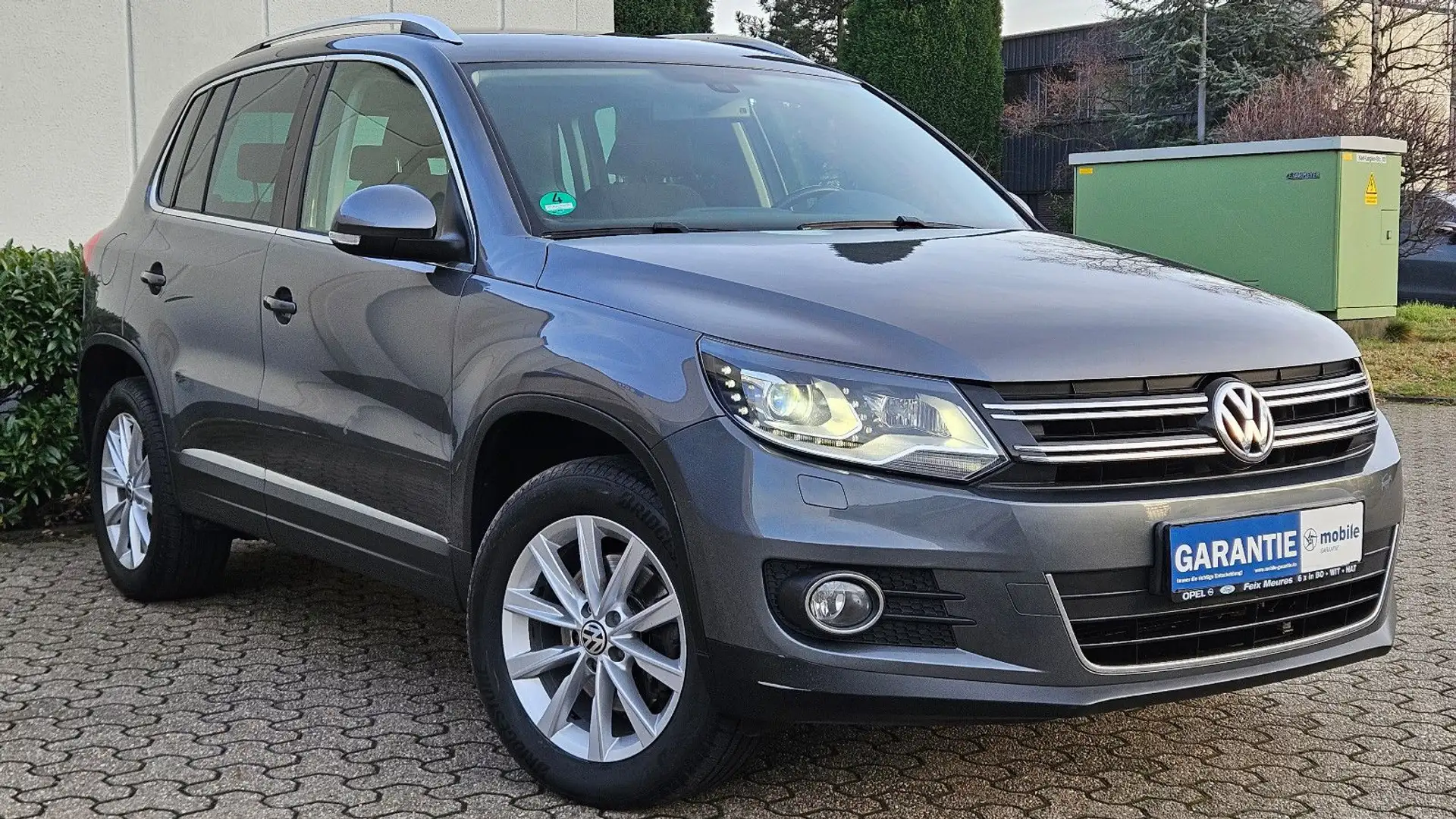 Volkswagen Tiguan 2.0 TSI 4MOTION HIGHLINE*DSG*PDC*AHK*NAVI Grau - 1