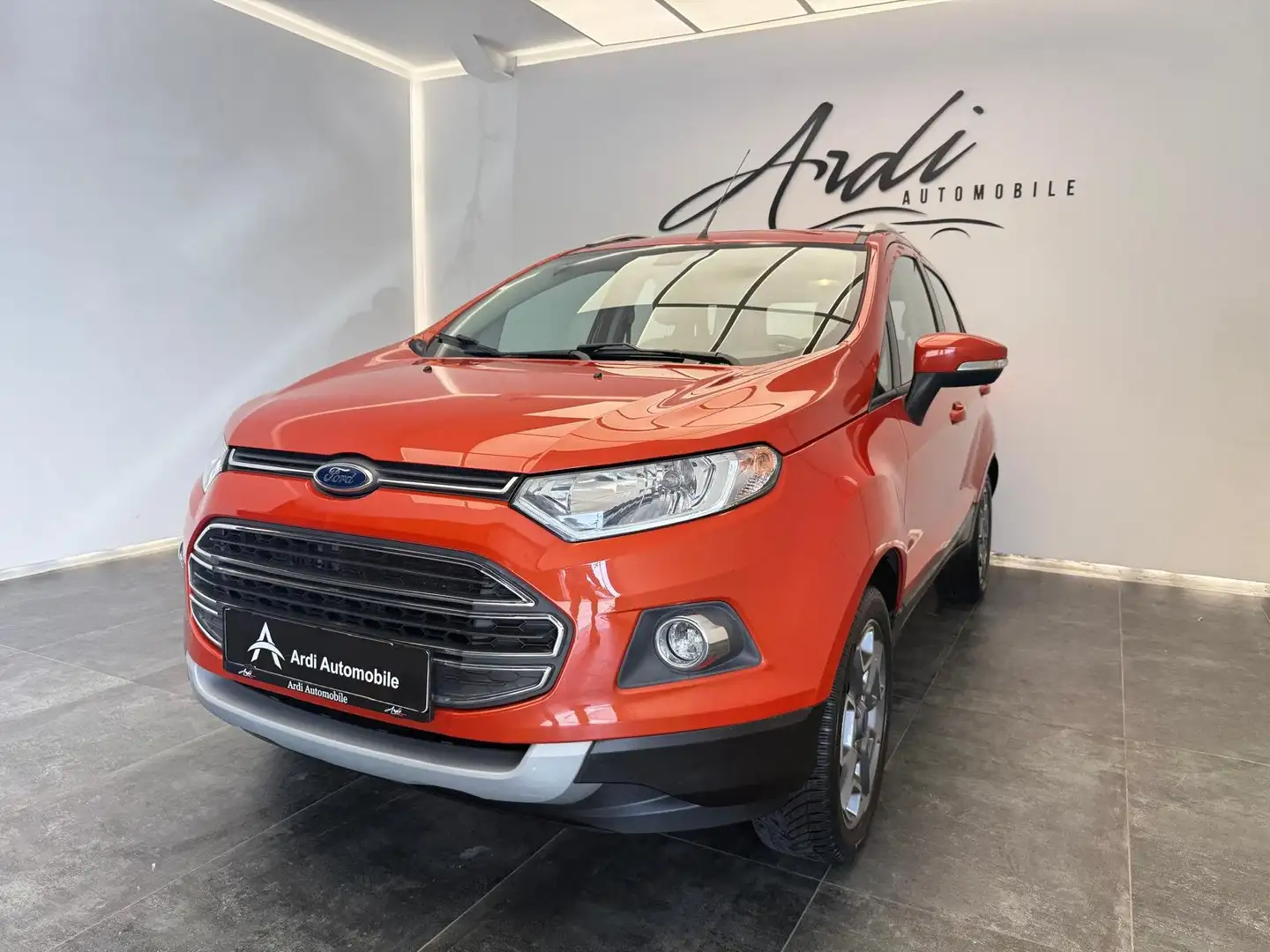 Ford EcoSport 1.0 *GARANTIE*BLUETOOTH*CAPTEURS*AIRCO*CRUISE* Orange - 1