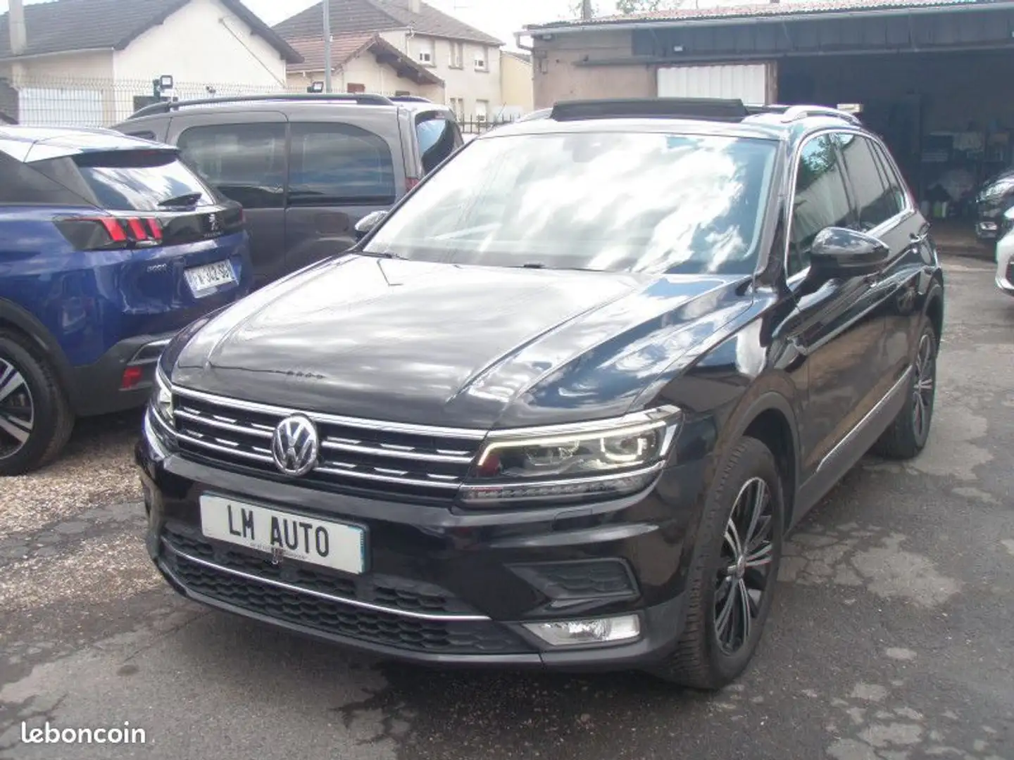 Volkswagen Tiguan II 2.0 TDI 150 BLUEMOTION TECHNOLOGY CARAT EXCLUSI Noir - 1