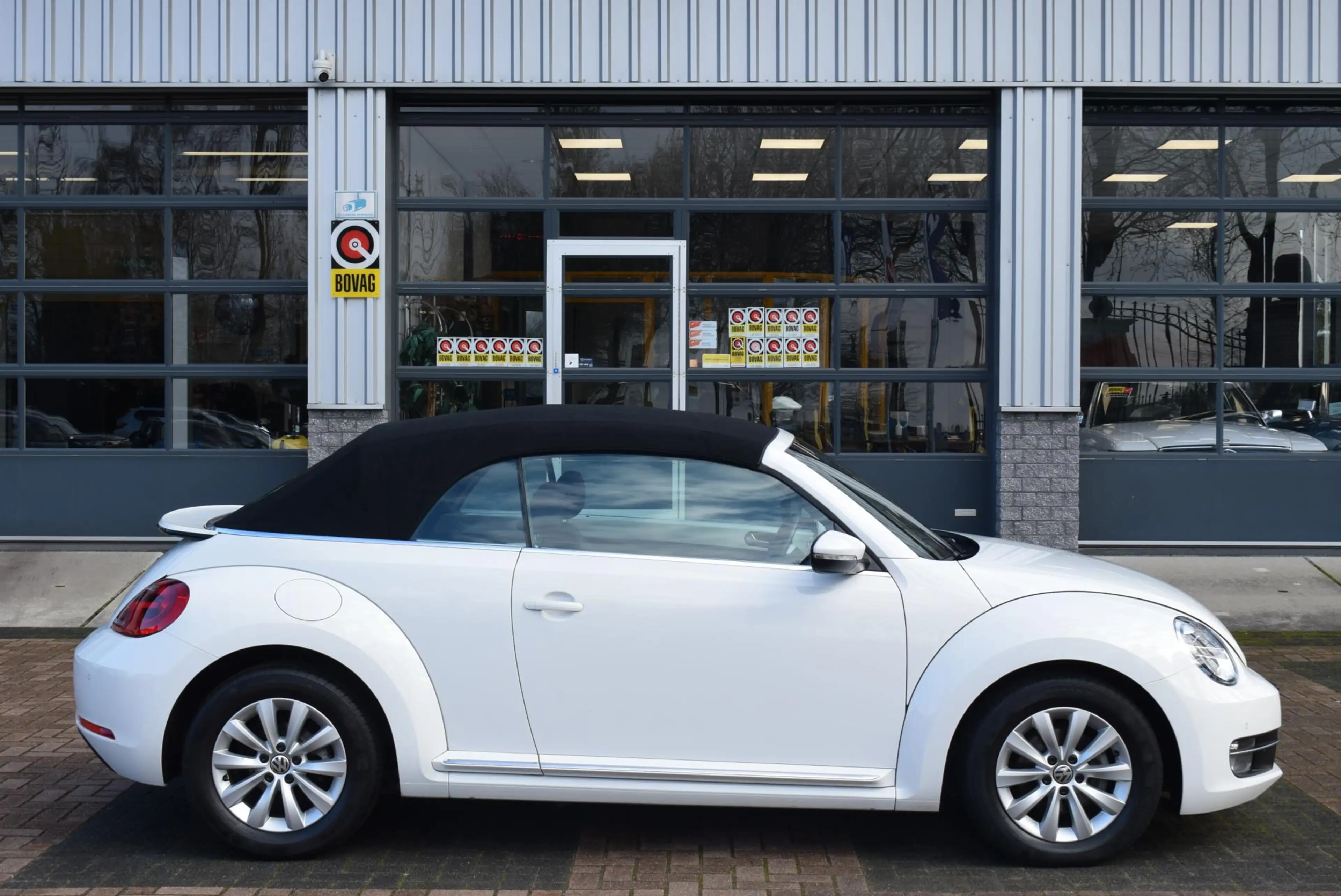 Volkswagen Beetle Cabriolet 1.2 TSI Design BlueMotion Navi Airco Km — photo 4