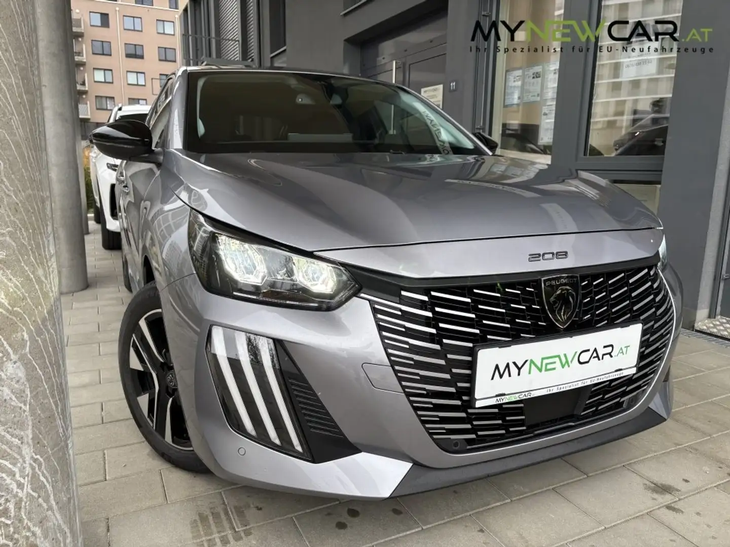 Peugeot 208 Allure Hybrid 110 e-DCS6 | 4 Jahre Garantie! Gris - 1