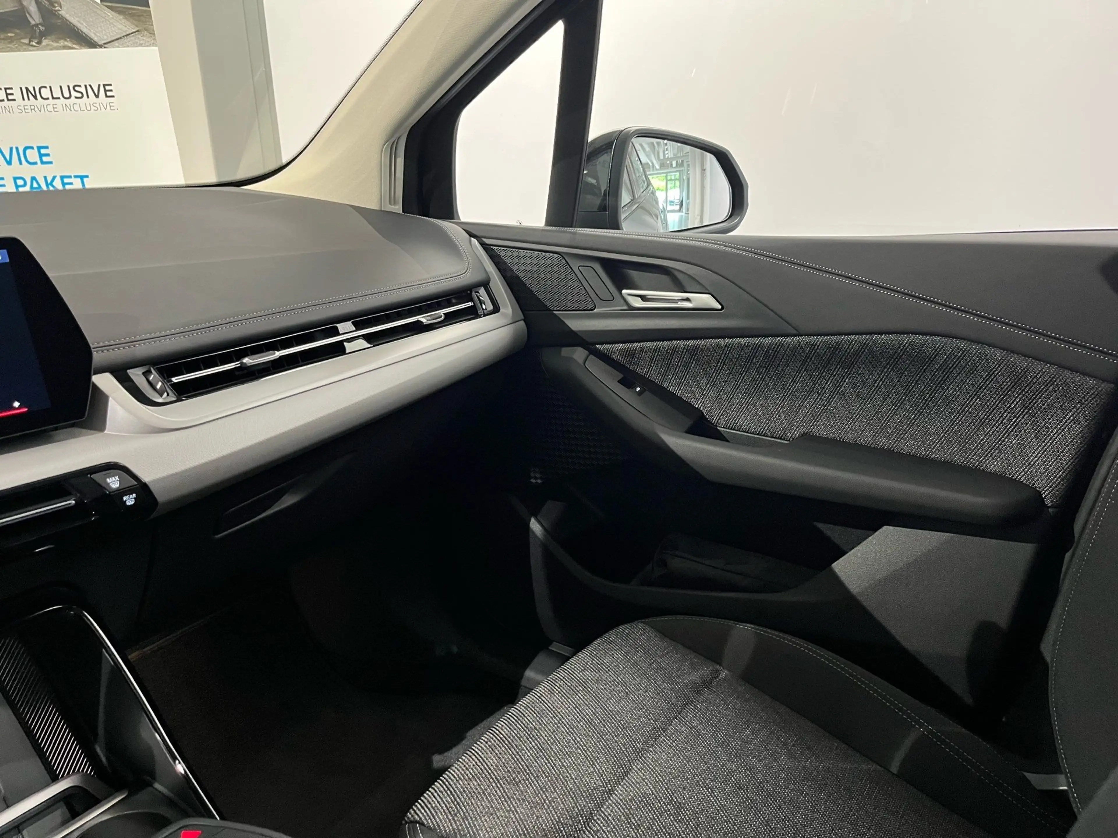 BMW 230 e xDrive — photo 13