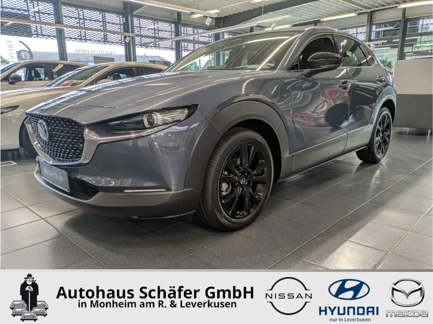 Mazda CX-30 (2025) HOMURA e-Skyactiv-G 140PS 6AT HUD Navi LED Gris - 1