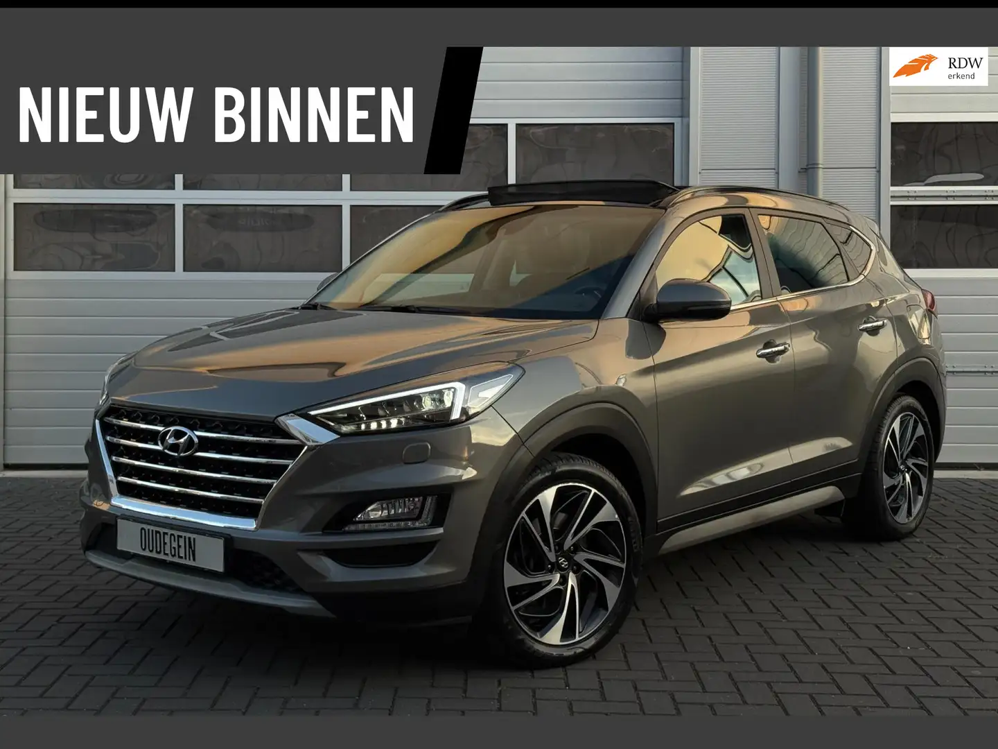Hyundai TUCSON 1.6 T-GDI 4WD Premium / Carplay / Pano / 360 Camer Grijs - 1