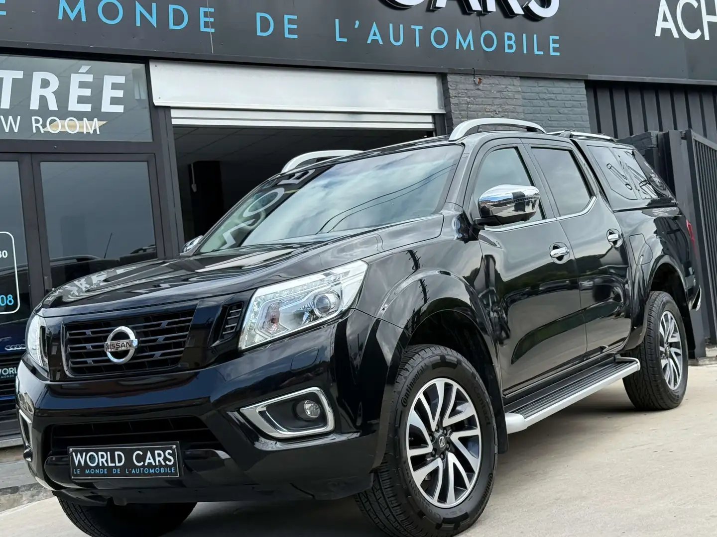 Nissan Navara 2.3DCI 190CV TEKNA / TVAC*BTW-IN / BOITE AUTO FULL Noir - 1