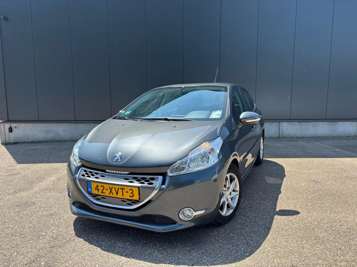 Peugeot 208 1.4 e-HDi Blue Lease Grijs - 1