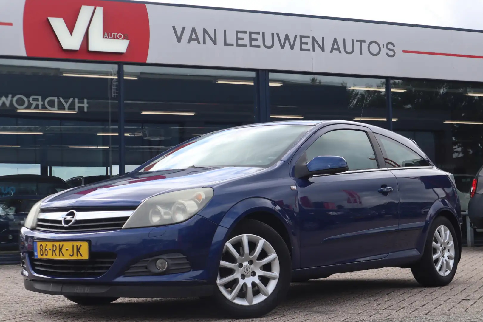 Opel Astra GTC 1.6 Sport | Inruilkoopje | Zo Mee | APK 10-01- Blauw - 1