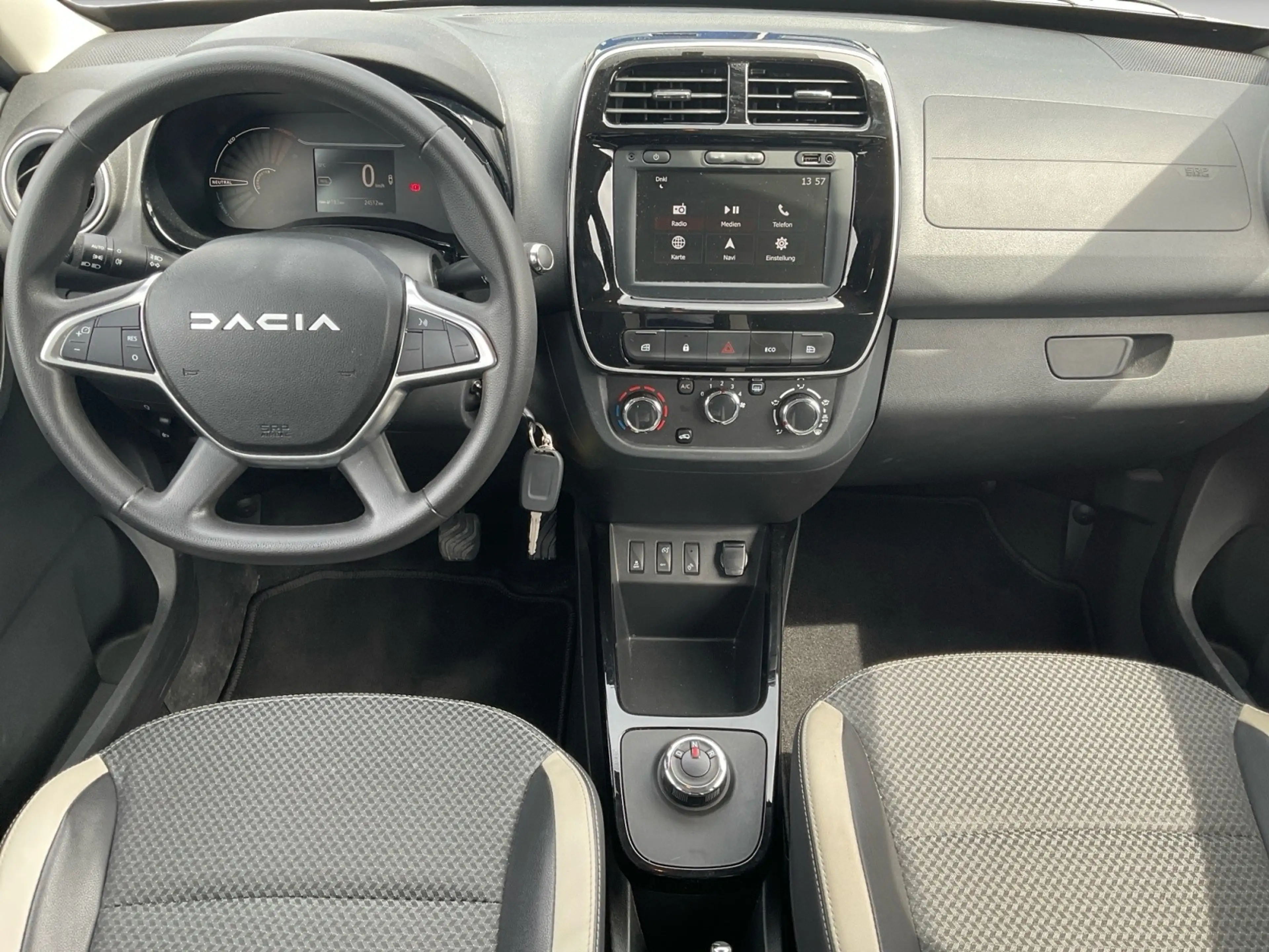 Dacia Spring Essential — photo 9