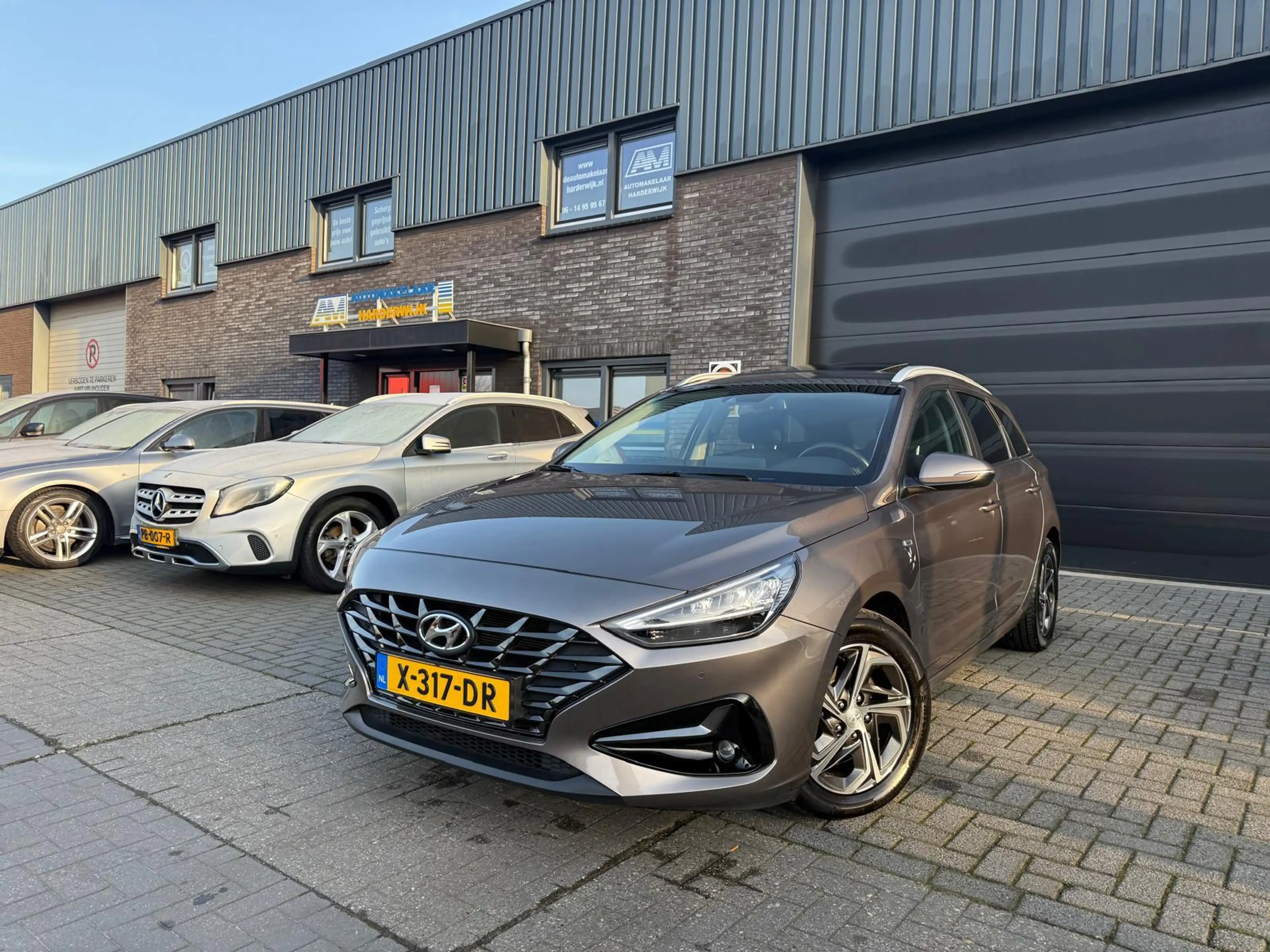 Hyundai i30 Wagon 1.5 T-GDi MHEV Premium | 1E EIGENAAR | 3/6/1 — photo 2