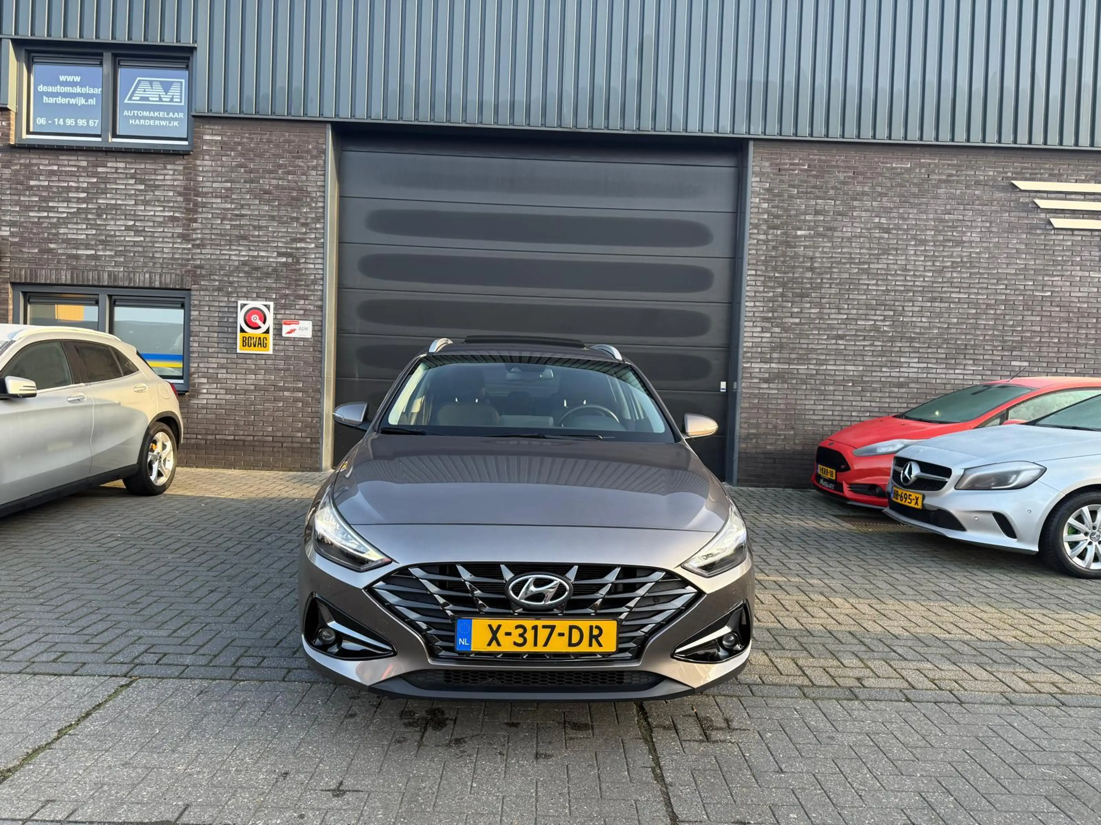 Hyundai i30 Wagon 1.5 T-GDi MHEV Premium | 1E EIGENAAR | 3/6/1 — photo 3