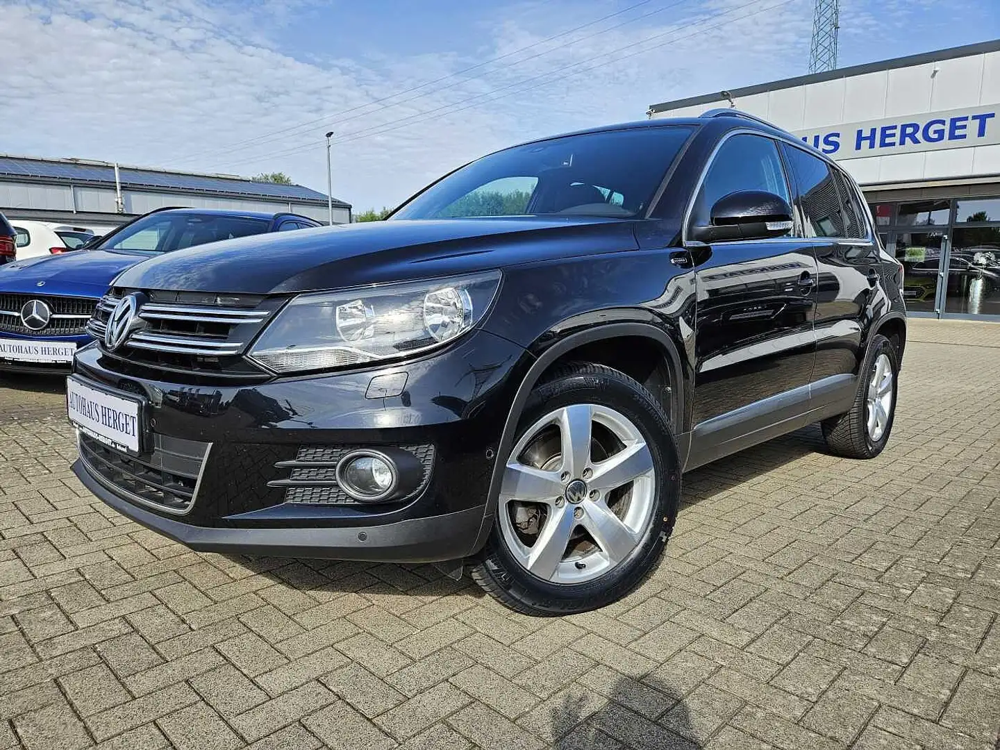 Volkswagen Tiguan 1.4 TSI DSG BMT Lounge Sport & Style 2.Hand/Scheck Zwart - 1