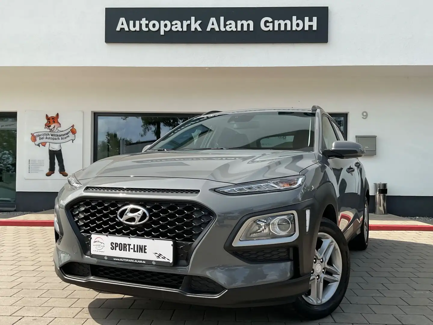 Hyundai KONA Select 2WD SHZ Alu DAB RFK Klima Spurhalte Gris - 1