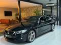 BMW 420 4-serie Coupé 420i High Executive Sport Line Nap L Zwart - thumbnail 2