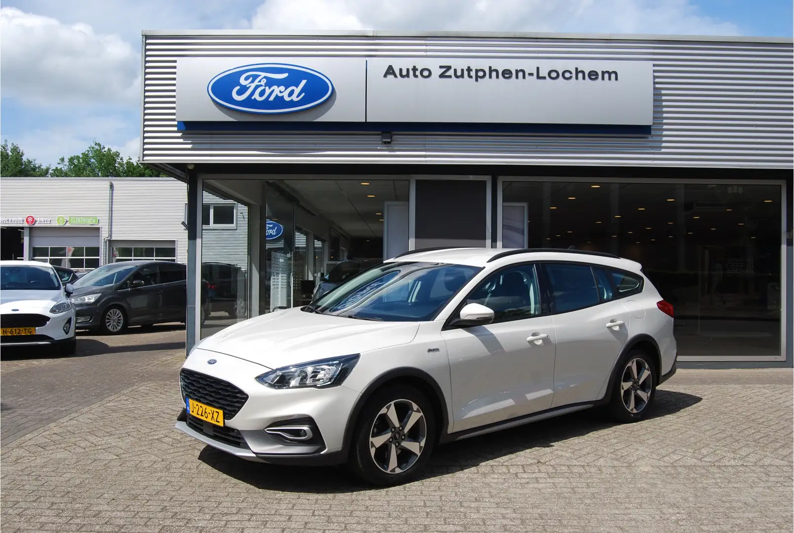 Ford Focus Wagon 1.0 EcoBoost 125PK Hybrid Active Business TR Blanc - 1