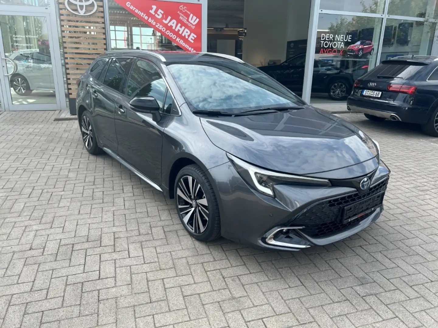 Toyota Corolla TS 1,8 l Hybrid Teamplayer ACC SHZ Navi LED El. He Gris - 1