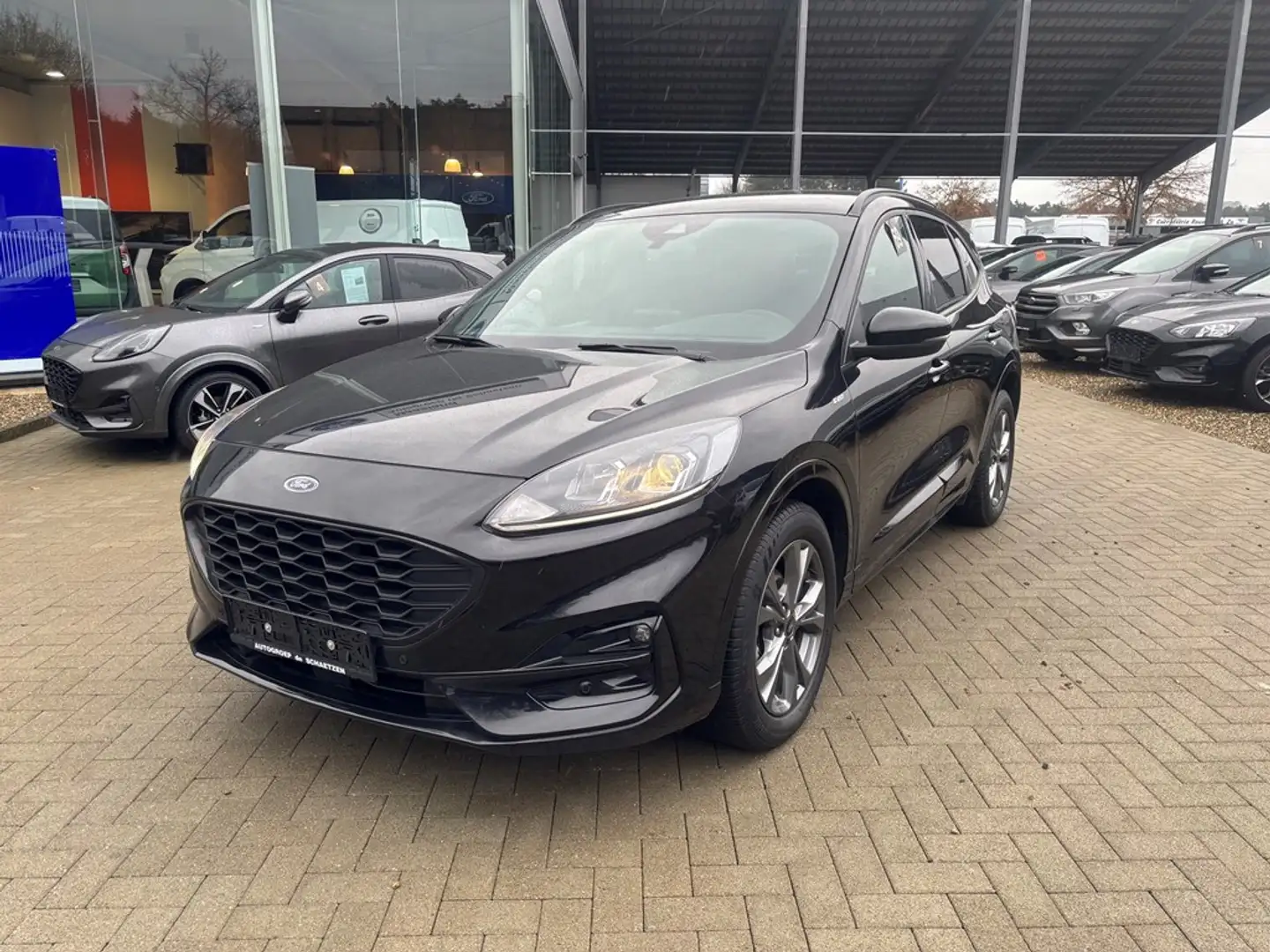 Ford Kuga ST Line 2.5 FHEV AWD 190PK Met Winterpack Zwart - 1