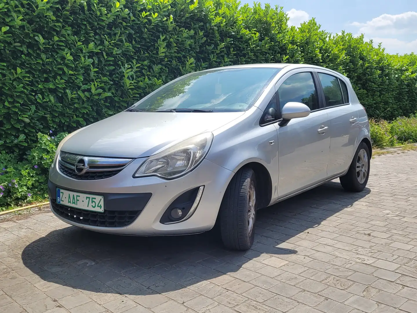 Opel Corsa 1.2i AIRCO euro 5 2012 !!! EERST LEZEN !!! Gris - 1