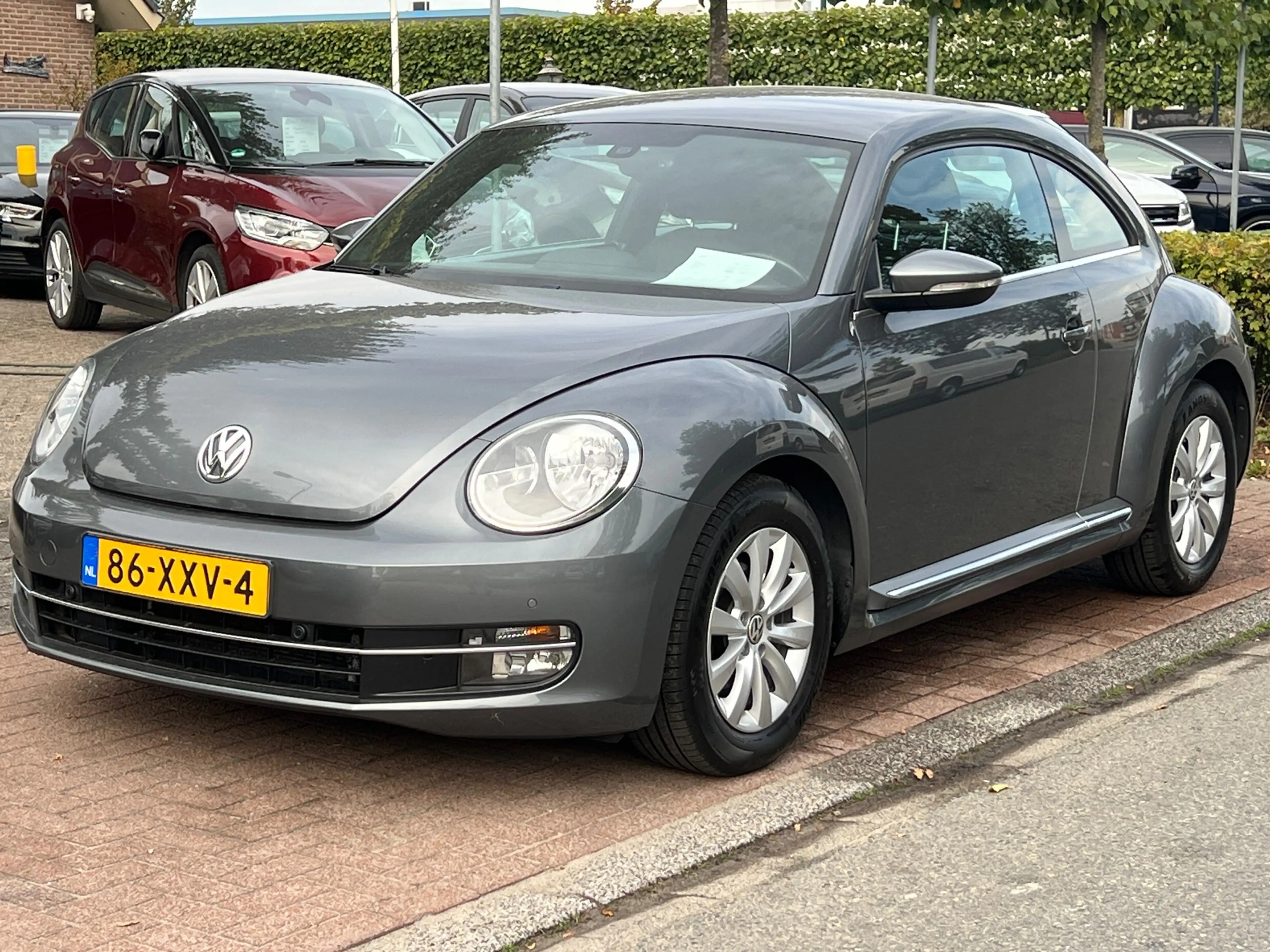 Volkswagen Beetle 1.2TSI *Navi|PDC| Nette Auto — photo 2