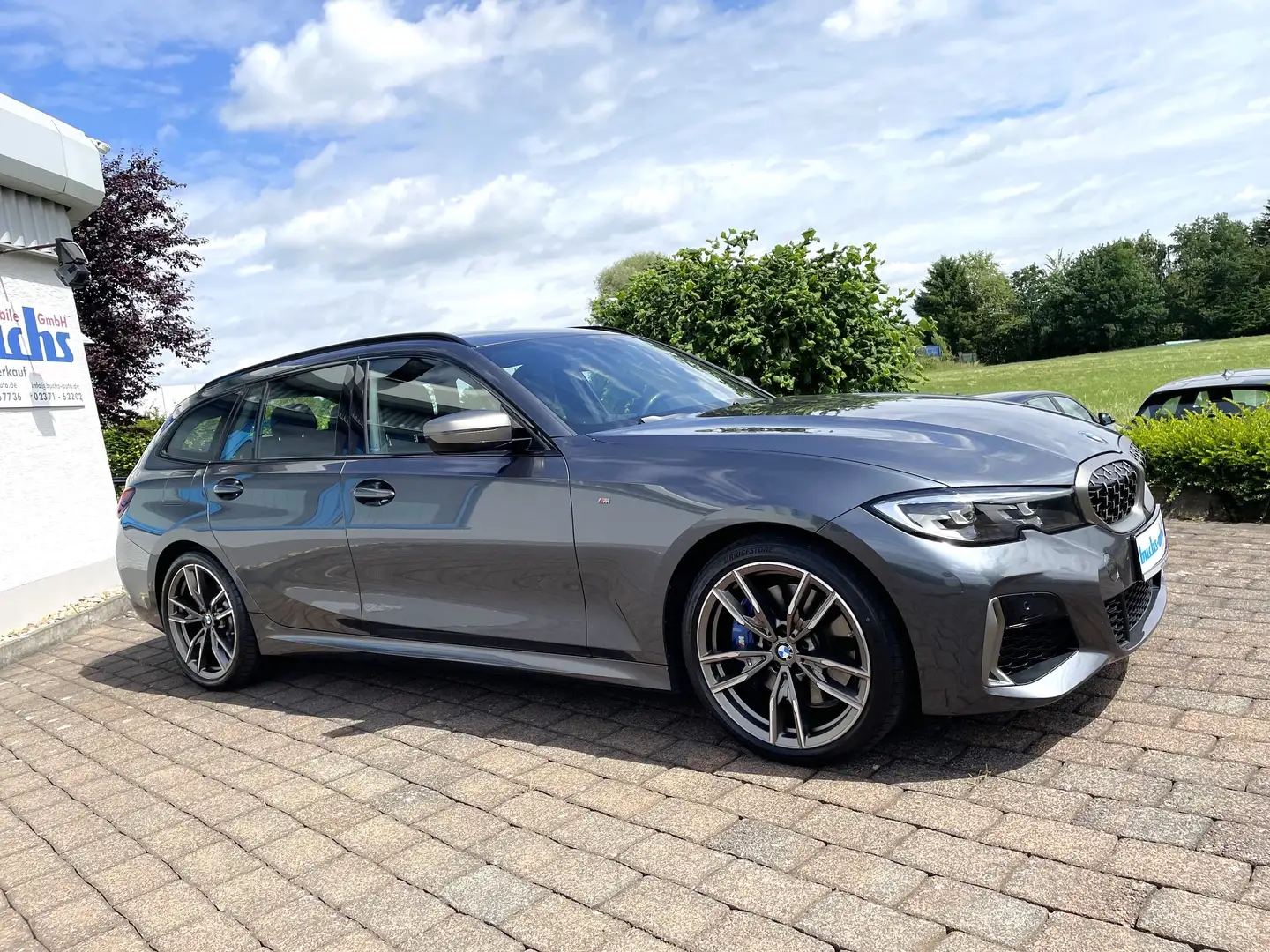 BMW 340 M340d xDrive Touring AHK HUD Grijs - 1