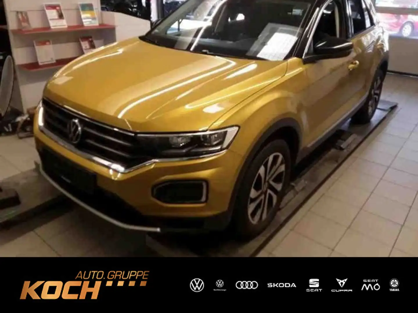 Volkswagen T-Roc 1.5TSI Avtive DSG Pano Navi LED Kamera Geel - 1