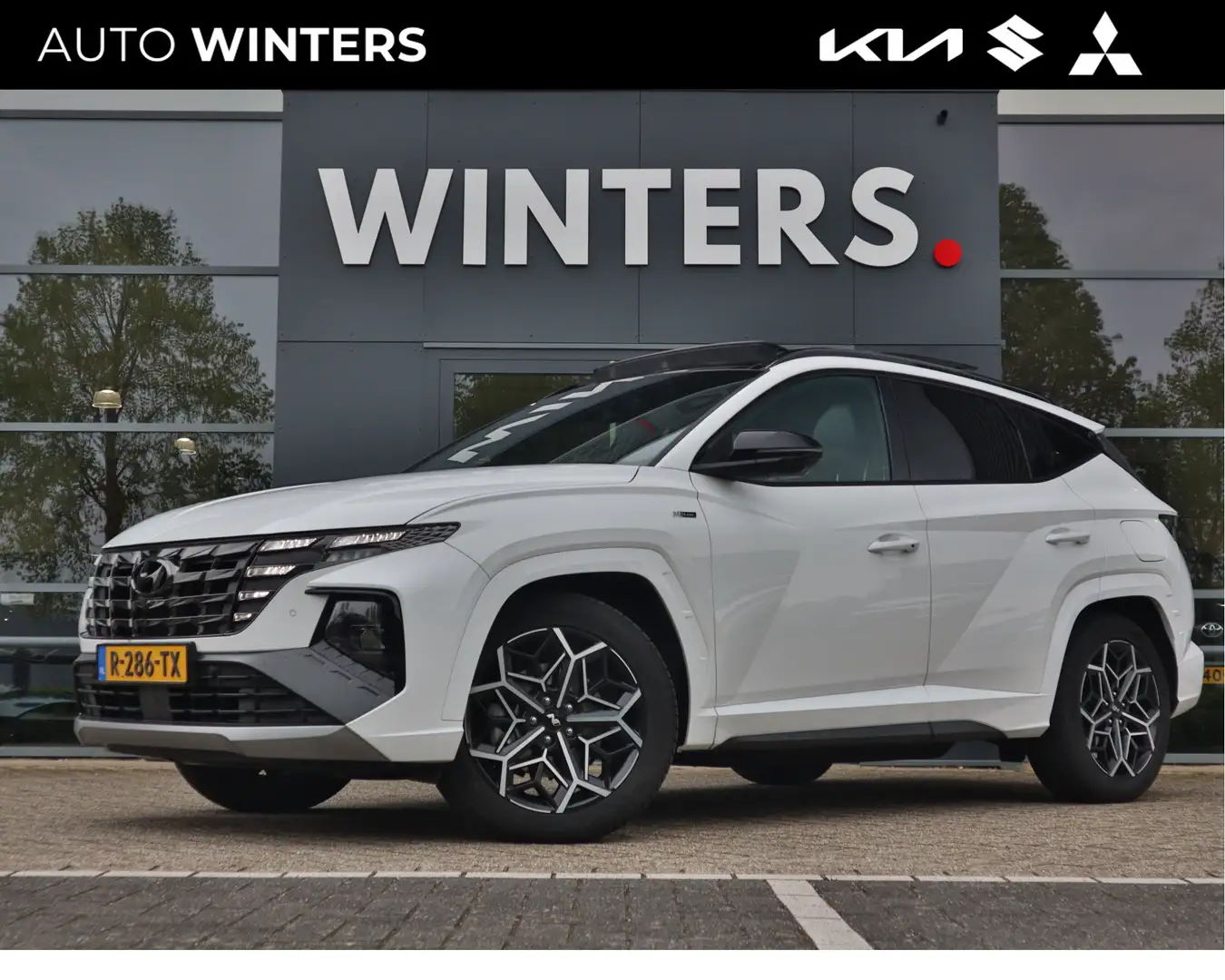 Hyundai TUCSON 1.6 T-GDI Plug-in PHEV N Line Sky 4WD | Panorama d Wit - 1