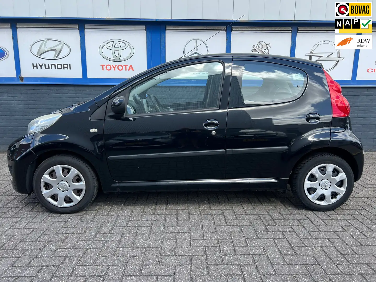 Peugeot 107 1.0-12V XS 09-2010 128000km NWE.APK 2995EU Zwart - 1
