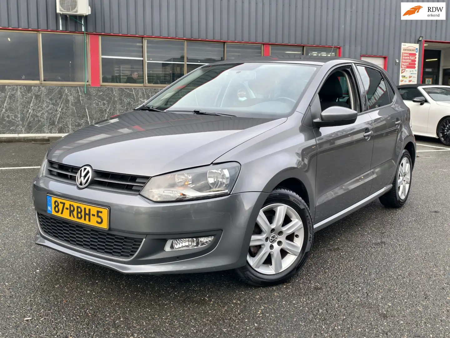 Volkswagen Polo 1.2 TSI Highline / DSG-AUTOMAAT / AIRCO / OHB / SP Gris - 1