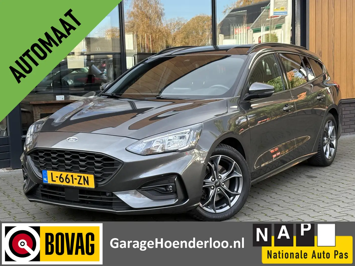 Ford Focus Wagon 1.0 EcoBoost ST-Line, Trekhaak, Stoel/Stuurv Gris - 1